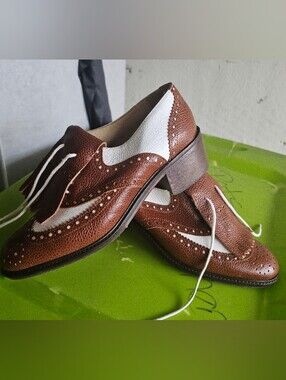Womens Two-Tone Brown and White Wingtip Loafers